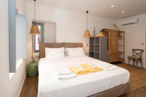Posteľ alebo postele v izbe v ubytovaní Pylosea Luxury Lodge