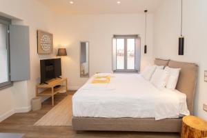 Posteľ alebo postele v izbe v ubytovaní Pylosea Luxury Lodge