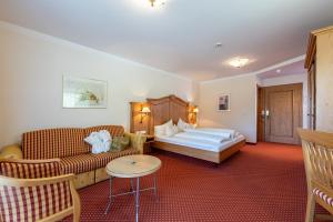 Postel nebo postele na pokoji v ubytování Hotel Gletscherblick
