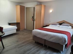Letto o letti in una camera di Hotel New Flanders