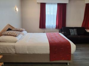 Letto o letti in una camera di Hotel New Flanders