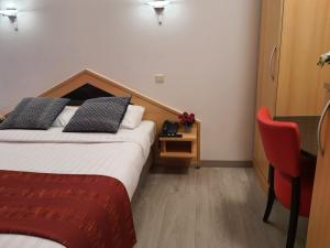 Letto o letti in una camera di Hotel New Flanders