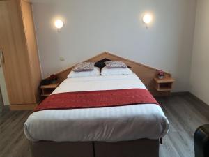 Letto o letti in una camera di Hotel New Flanders
