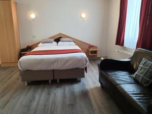 Letto o letti in una camera di Hotel New Flanders