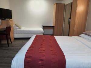 Letto o letti in una camera di Hotel New Flanders