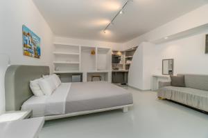 Kuchyň nebo kuchyňský kout v ubytování Central Fira Suites