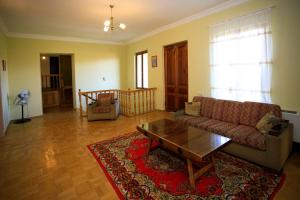 Posezení v ubytování Bucha`s Guest House & Wine Cellar