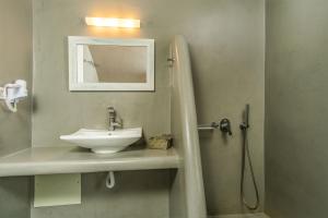 Vannituba majutusasutuses Central Fira Suites