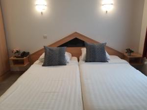 Letto o letti in una camera di Hotel New Flanders