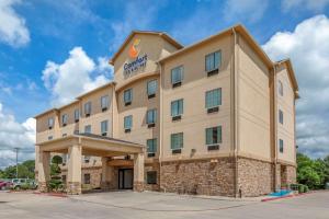 a rendering of the front of a hotel at Comfort Inn & Suites Paris in Paris