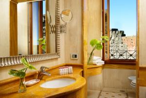 Een badkamer bij Hotel Forum
