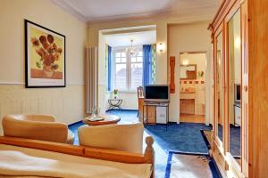 Khu vực ghế ngồi tại Stadthotel Detmold