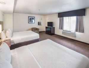 Tempat tidur dalam kamar di Clarion Inn Page - Lake Powell