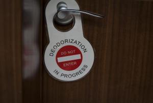 a do not enter sign on a wooden door at Posada del León de Oro Boutique Hotel in Madrid