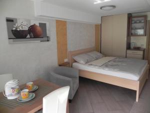Postel nebo postele na pokoji v ubytování Apartments Vesna