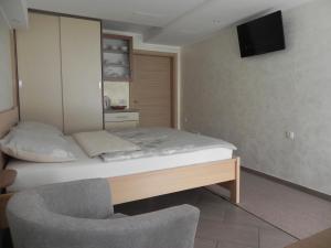 Apartments Vesna tesisinde bir odada yatak veya yataklar