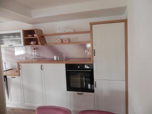 Kuchyň nebo kuchyňský kout v ubytování Apartments Vesna