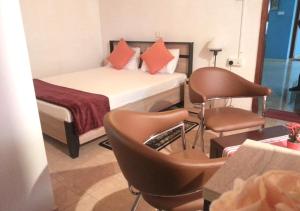 Cama ou camas em um quarto em Mahoya