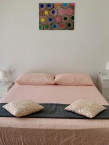 Posteľ alebo postele v izbe v ubytovaní Ennodio Apartment