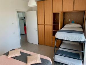 Posteľ alebo postele v izbe v ubytovaní Ennodio Apartment