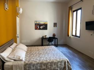 Кровать или кровати в номере Triquetra - Rooms for Rent