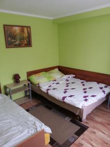 Posteľ alebo postele v izbe v ubytovaní Pod Klonem
