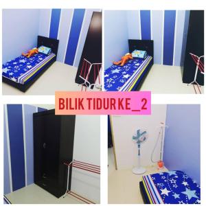 Postel nebo postele na pokoji v ubytování QHALIF GUEST HOUSE GAMBANG HOMESTAY