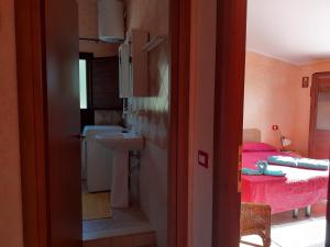 Ванная комната в B&B Sa Funtana