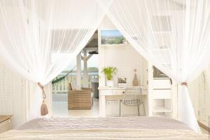 Fotografie z fotogalerie ubytování Bungalow Vanille Pacane - Vue Mer avec Spa Privé v destinaci Les Trois-Îlets