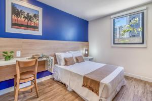 Postel nebo postele na pokoji v ubytování Cais da Praia Hotel + 33 fotografií