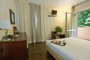 Postel nebo postele na pokoji v ubytování Hotel 2C + 37 fotografií