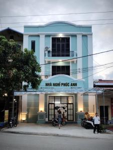 a building with a mma merit pics amm on it at PHÚC ANH Hotel 1 in Bản Co