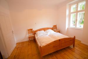 Postel nebo postele na pokoji v ubytování Villa Hardegg