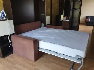 Кровать или кровати в номере Apartment Ivushka