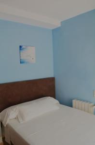 Postel nebo postele na pokoji v ubytování Hotel L'Escala