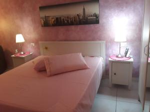 Postel nebo postele na pokoji v ubytování Suites Florence