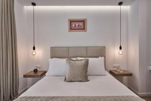 Charitos Boutique Apartment, Kolonaki 객실 침대