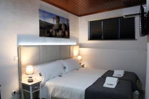 Ένα ή περισσότερα κρεβάτια σε δωμάτιο στο Casa Don Diogo - Guest House
