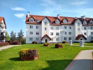 Afbeelding uit fotogalerij van Green Apartment z bezpłatnym parkingiem in Olsztyn