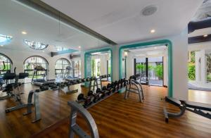 an empty gym with several treadmills and machines at Lacasita HuaHin by Pahmai in Hua Hin