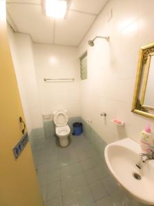 Ένα μπάνιο στο Homestay Kondo Mewah l/d kolam renang & playground di Kota Bharu