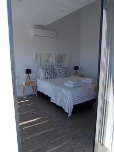 Flamingo Beach House客房内的一张或多张床位