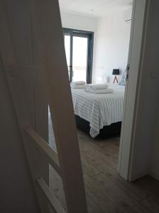 Flamingo Beach House客房内的一张或多张床位