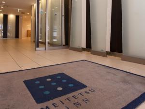 a lobby with a welcome mat on the floor at Meitetsu Inn Nagoya Nishiki in Nagoya +23 photos