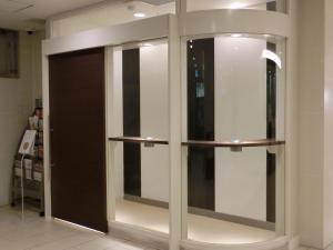 a display case in a store with two glass doors at Meitetsu Inn Nagoya Nishiki in Nagoya