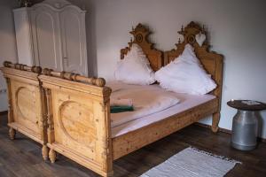 Postel nebo postele na pokoji v ubytování Malom Udvar Vendégház