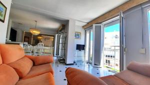 TV a/nebo společenská místnost v ubytování Apartamento Ducal con vistas al mar F5- 2