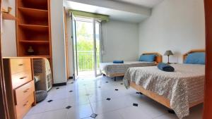 Postel nebo postele na pokoji v ubytování Apartamento Ducal con vistas al mar F5- 2