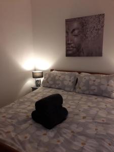 Postel nebo postele na pokoji v ubytování West Garth Cottage