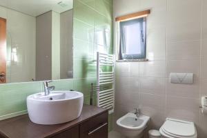 Koupelna v ubytování Apartamento 7 Mares com 2 Quartos + 29 fotografií